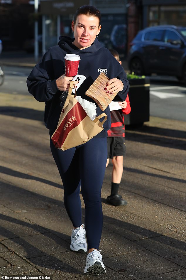 Coleen pictured today after walking into Costa Coffee in Alderley Edge, Cheshire