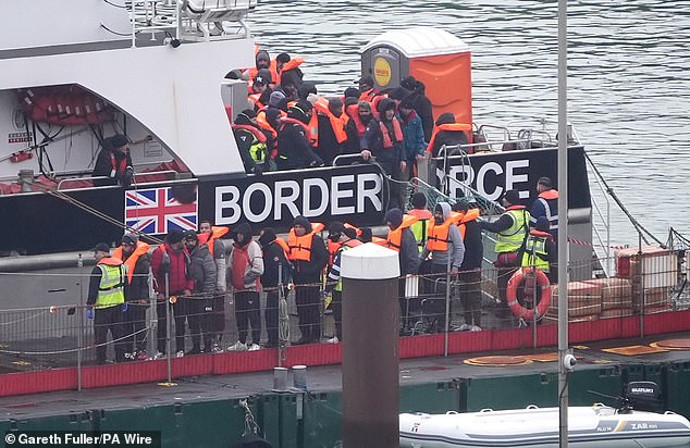 A group of people believed to be migrants are taken to Dover, Kent, from a Border Force ship following an incident with a small boat in the English Channel, December 29, 2024.