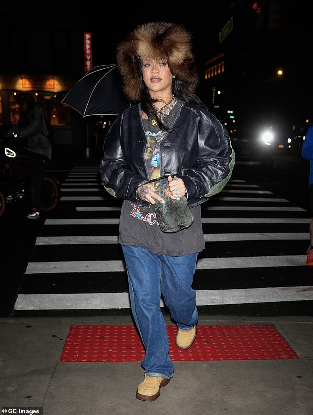 At the event, Rihanna sported an oversized fur hat, a Tupac-print shirt, jeans, and Bottega Veneta boots that sold for $1,400.