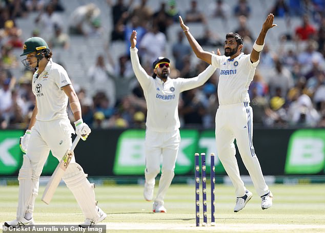 Jasprit Bumrah (right) is pictured after taking the wicket of Konstas at the MCG.