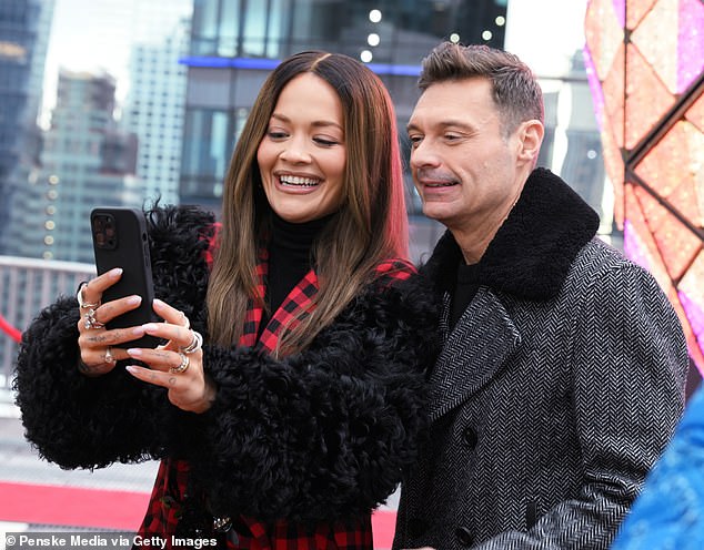 Ryan and Rita posed for selfies while at a pre-show event on Monday.