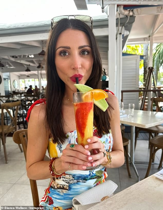 Bianca shared a stunning selfie with a cocktail