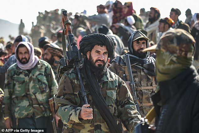 Taliban security personnel gather at the site two days after Pakistani airstrikes in Barmal district of eastern Paktika province on December 26, 2024.