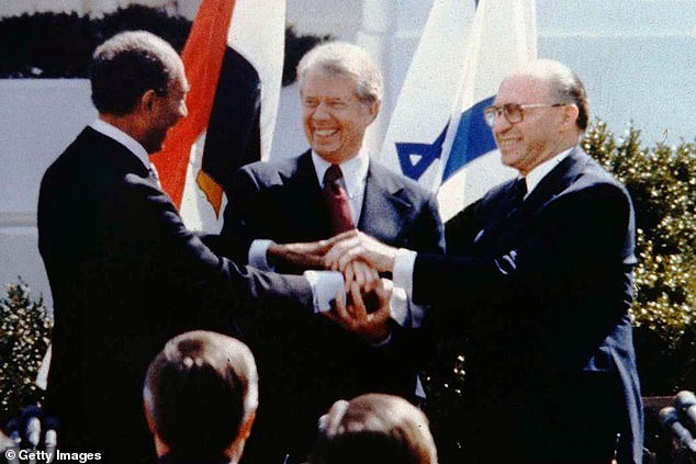 The Republican attacked Carter for what he painted as meddling in the Middle East and Asia after his presidency and denounced his support for Palestine. Carter is known for mediating a famous peace treaty between Israel and Egypt in 1979, seen here