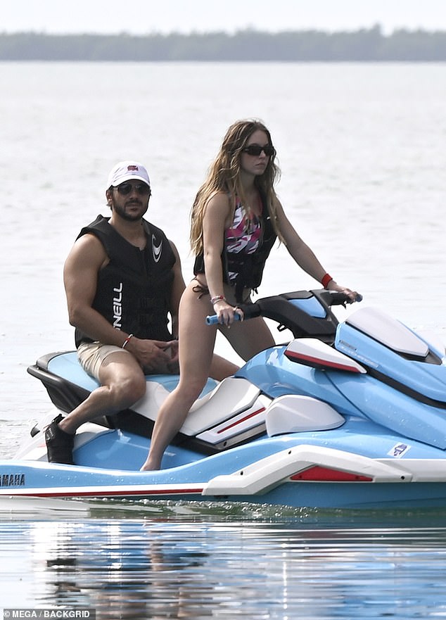 She also revealed her toned legs while hopping on a jet ski with her fiancé Jonathan Davino at their new $13 million mansion in the Florida Keys.