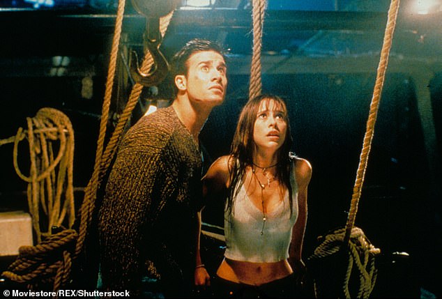 The actress, 45, played Julie James in the 1997 horror classic and finally confirmed her return for the long-awaited reboot two weeks ago (pictured with Freddie Prinze Jr).