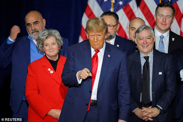 Trump's chief of staff, Susie Wiles (to Trump's left), told the nominees to approve their social media posts.