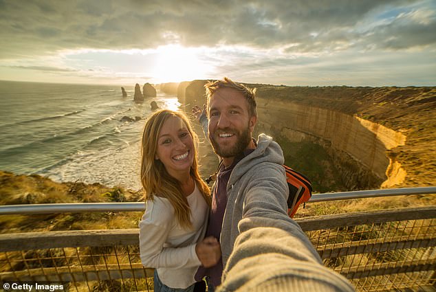 Victoria's new 7.5 per cent tax on short-term accommodation, including Airbnb, comes into effect on January 1 in a bid to raise $60 million (pictured, a young couple at the Los Angeles hotel). Twelve Apostles on Great Ocean Road).