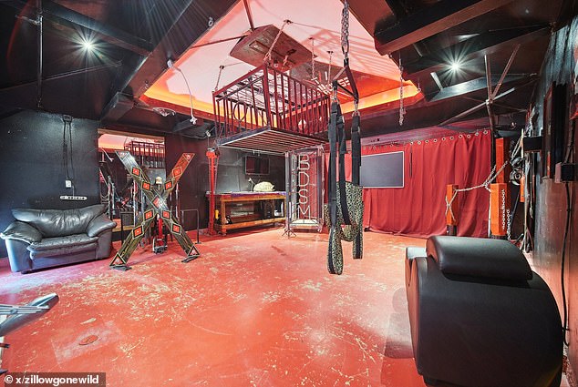 A sultry red and black room with leather sofas, a sex swing and a sign that says 'BDSM' has piqued the interest of X users