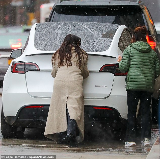 The Devil Wears Prada actress, who shares sons Jonathan, eight, and Jack, five, with husband Adam Shulman, bundled up in a stylish winter coat.