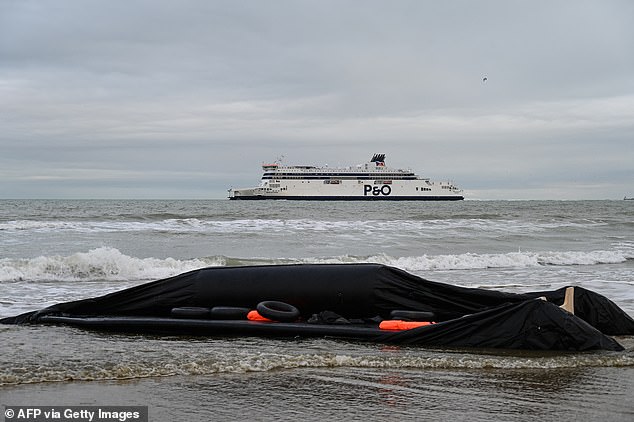 Life jackets, buoys and a deflated inflatable boat are seen, as a P&O ferry sails in the background, after a failed attempt by migrants to illegally cross the English Channel to reach Britain, on Sangatte beach, near Calais, northern France, on December 4, 2024. File photo