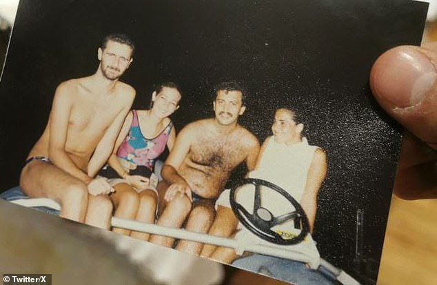 Rebels take a photograph believed to show Syrian President Bashar al-Assad wearing only swimming trunks after the capture of his palace in Aleppo.