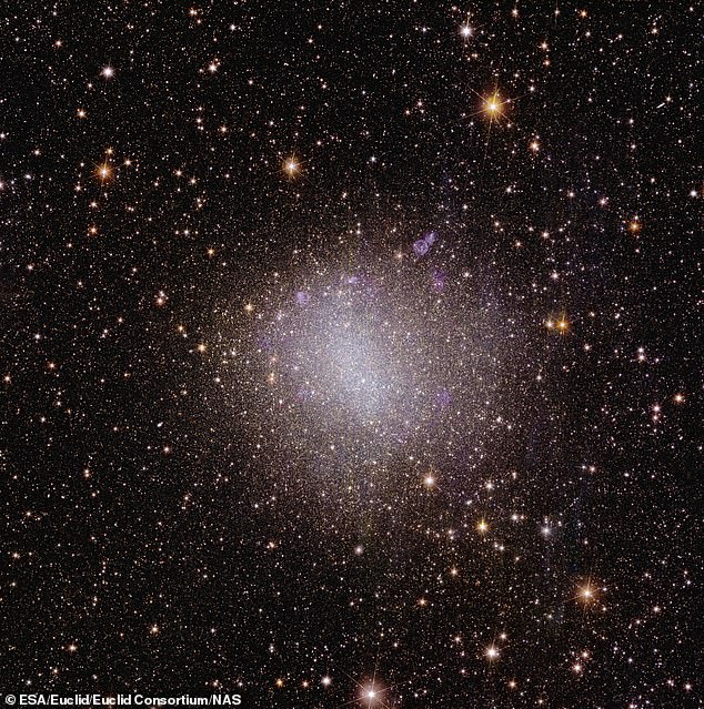 Dwarf galaxies only contain a few billion stars, while standard galaxies have hundreds of billions. This is the irregular dwarf galaxy NGC 6822, which is not part of the newly discovered group.