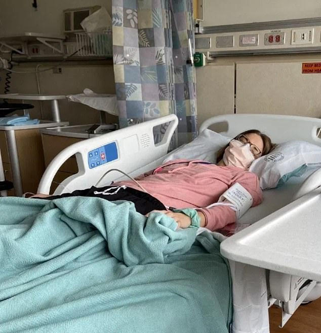 Ms Dressen is pictured above in hospital, following her reaction to the vaccine