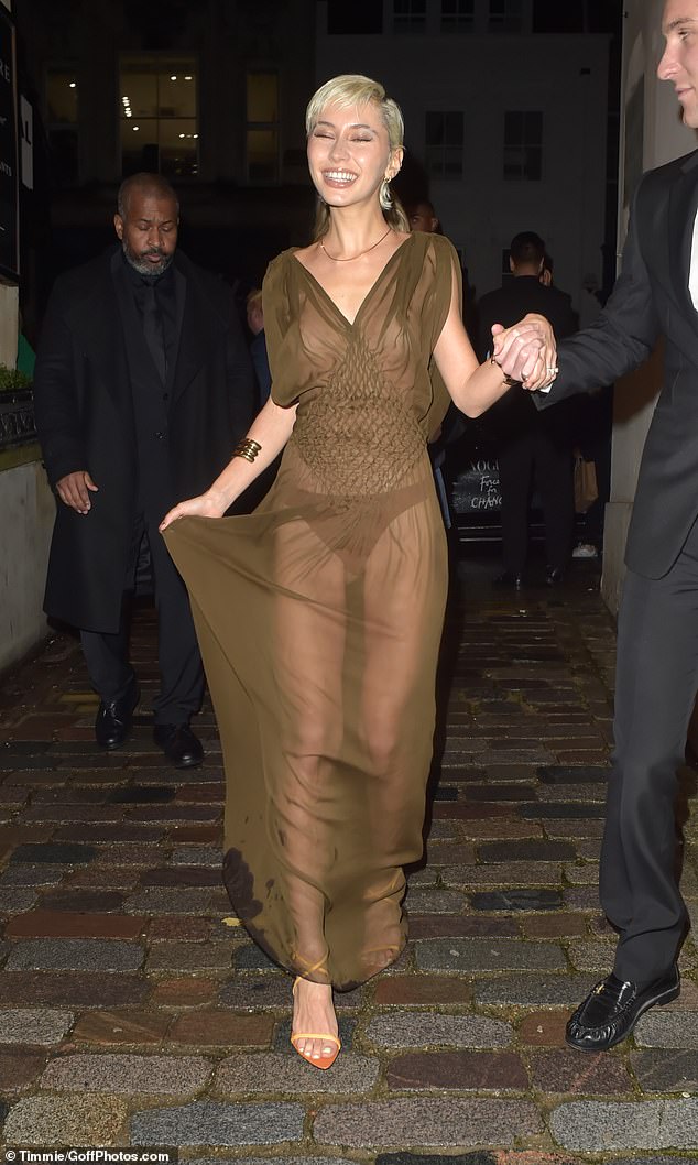 The model and actress, 24, joined a host of stars in a sheer dress as she arrived at the annual event.