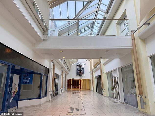 But now it's not the same. with a photograph taken last week in Evesham showing the shopping center virtually empty just days before Christmas.