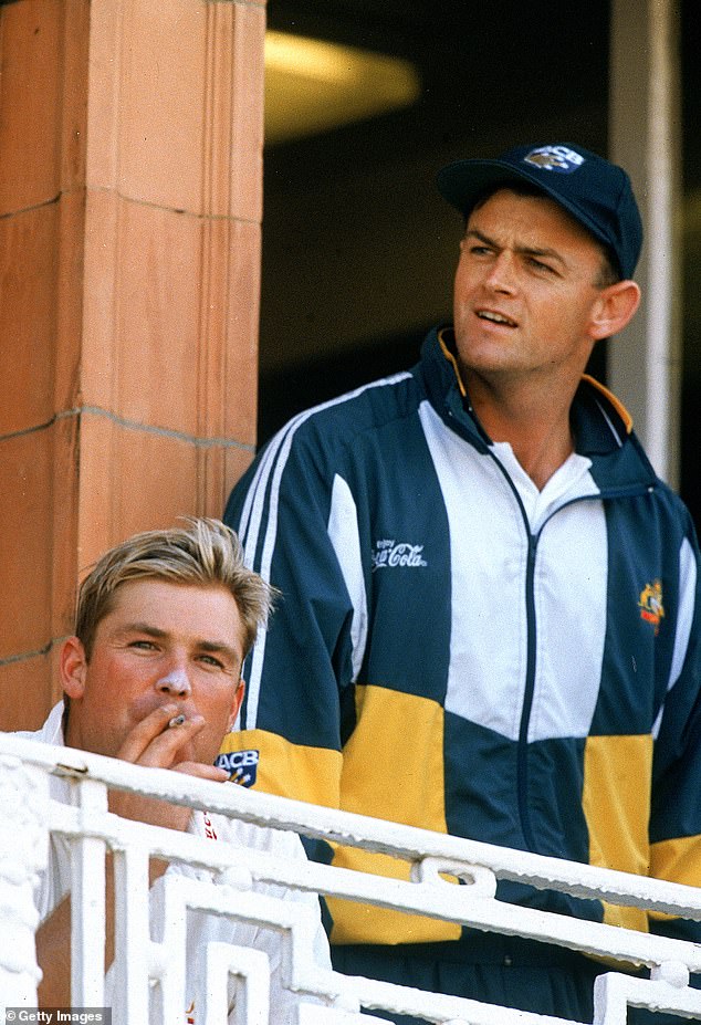 Considered one of the greatest bowlers of all time, he smoked throughout his 22-year international cricket career. Pictured: Shane Warne smoking a cigarette as Adam Gilchrist looks on during the second Ashes Test between England and Australia in 1997.