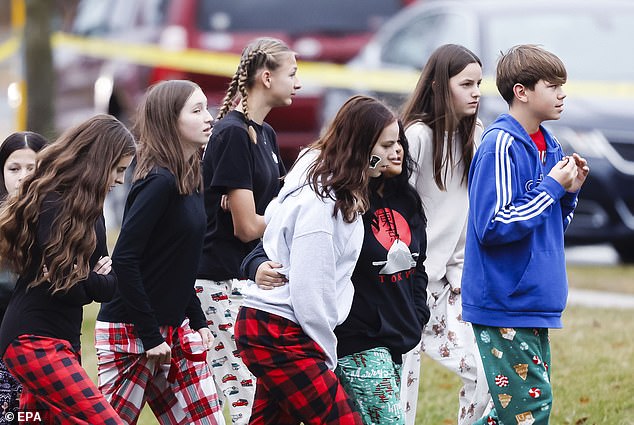 Students seen on the grounds of Abundant Life Christian School after Monday's shooting