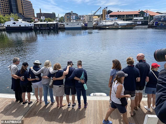 Police will investigate the deaths of the two sailors, off the New South Wales south coast, and prepare a report for the coroner that could trigger an inquest (people gather at Constitution Dock in Hobart to remember Mr Smith and Mr. Quaden).