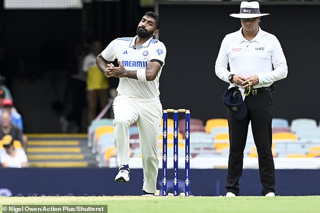 It came as Bumrah (left) took five wickets during Sunday's game at the Gabba, as Australia finished the day 405/7.