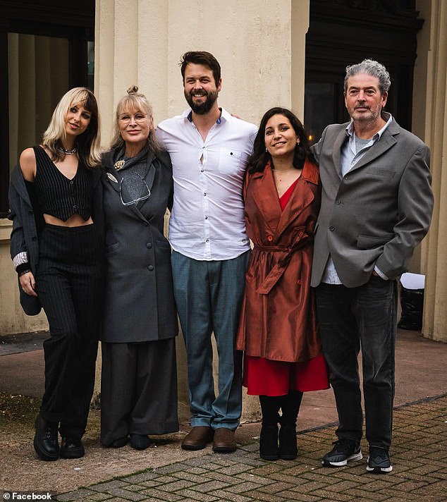 Royle, second from left, posted this image of her husband Julian, far right, on Instagram.