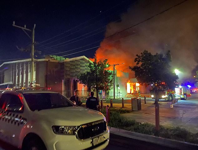 Photos from the scene showed the Synagogue well alight (pictured) as firefighters struggled to put out the flames as they razed the building.