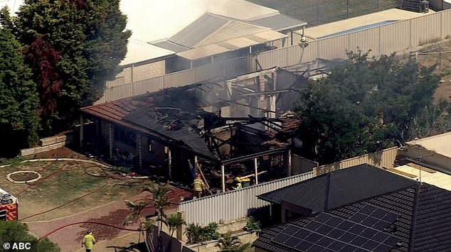 A child has died and two other children are being treated for smoke inhalation after a horrific house fire in Mandurah just days before Christmas (pictured)