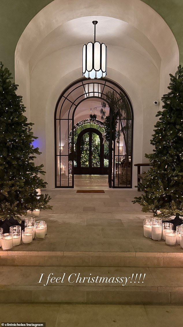 The couple's friend Clint Nicholas shared photos of the home on Instagram, including one showing an incredibly festive entryway.