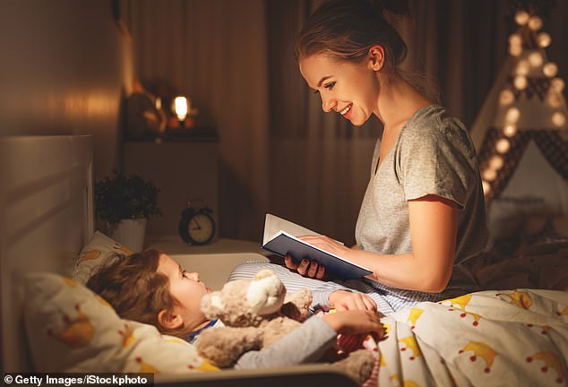 To help combat anxiety and excitement in young children, Gibson recommends a bath, soft music, reading or selecting bedtime stories that are calming rather than exciting (file image)