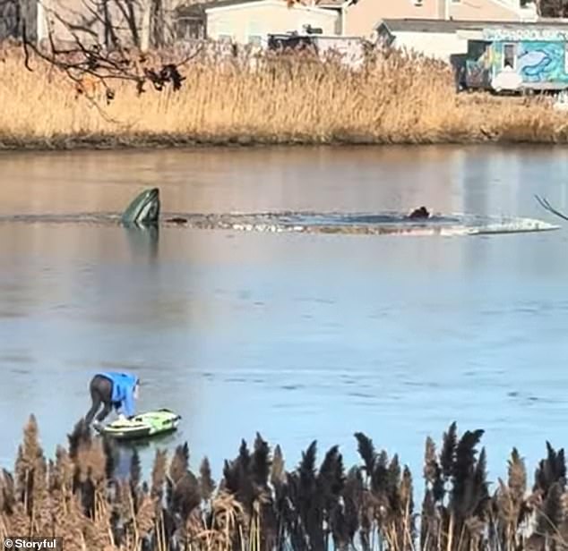 Masotto can be seen moving cautiously across the frozen stream in search of the frozen man.