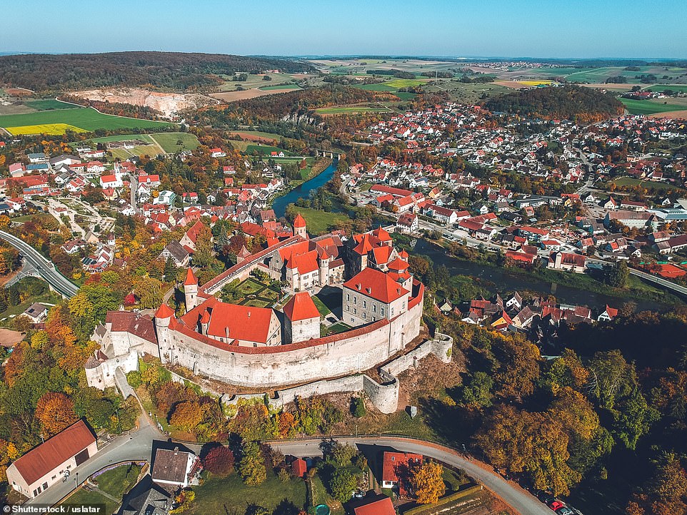 Harburg Castle is one of the best preserved historic castles in Germany. Lonely Planet comments: 'Lovering over the River Wornitz, the 12th-century (castle's) covered medieval parapets, turrets, turrets, keep and red-tiled roofs are so perfectly preserved that they almost look like a movie set.'