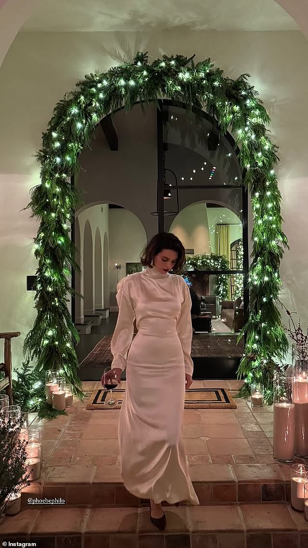 The party appeared to be held at Kendall Jenner's house this year. In a photo of herself in front of her mansion, which she recently showed off in a home tour video, the supermodel, 29, also showed off her chic Christmas party look and seemingly confirmed that the family went with a white Christmas theme. for your outfits this year