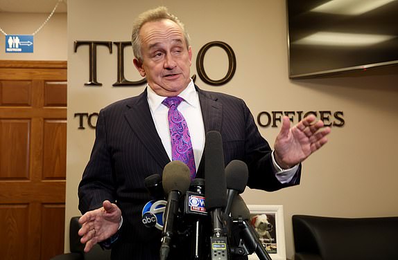 Criminal defense attorney Thomas M. Dickey addresses members of the media during a press conference Tuesday afternoon, December 10, 2024, at his office regarding his client Luigi Mangione, the alleged shooter of healthcare CEO Brian Thomson last week in New York. Luigi Mangione remained imprisoned in Pennsylvania, where he was initially charged with possession of a firearm without a license, forgery and providing false identification to police. (Luiz C. Ribeiro for DailyMail.com)