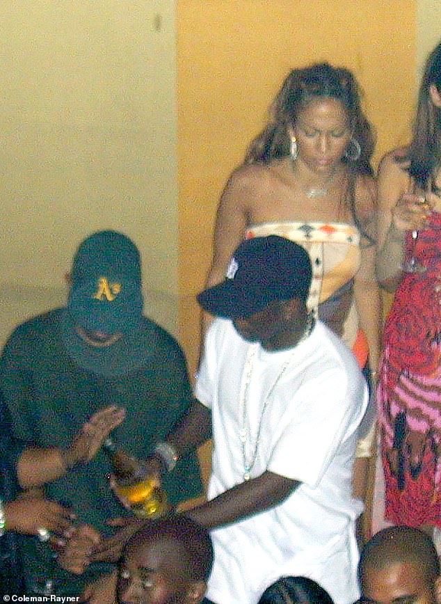 The photos were taken at the now-defunct Lotus nightclub in New York on September 7, 2000. J Lo is with her sister Lynda and scowls at Diddy after their apparent argument.