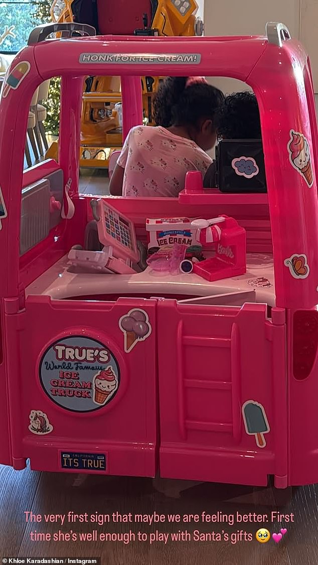 Chicago cousin True Thompson, 6, was reported to be recovering after a 105-degree fever kept her on bed rest over the holidays. True's mom, Khloe Kardashian, posted this photo of the patient playing with a toy Santa ice cream truck.