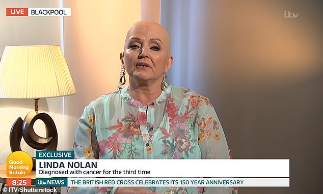 Linda recalled the fall, which occurred in October, and how her sudden lack of teeth, along with baldness due to chemotherapy, scared away traffickers (pictured in 2020).