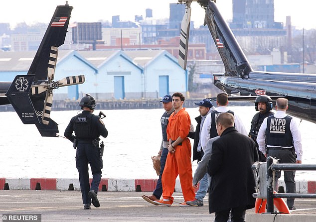 Mangione is seen in Manhattan before his arraignment. The NYPD mobilized a huge force to escort him to court