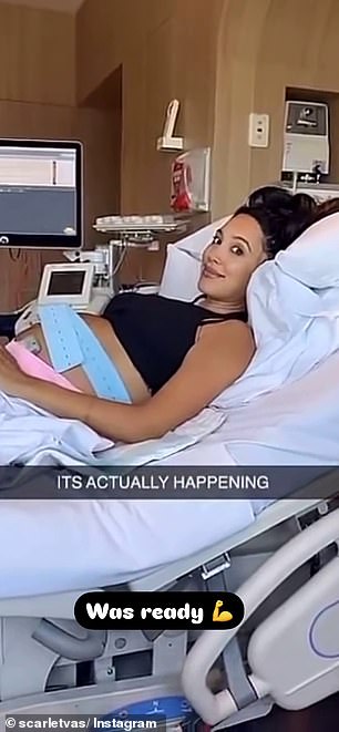 In one video, the 29-year-old lay in a hospital bed as contractions began.