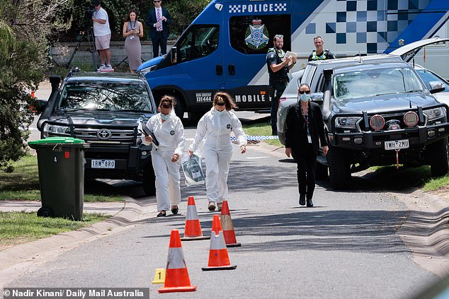 Police and forensic teams are pictured on Parson St in Rye on Monday morning.