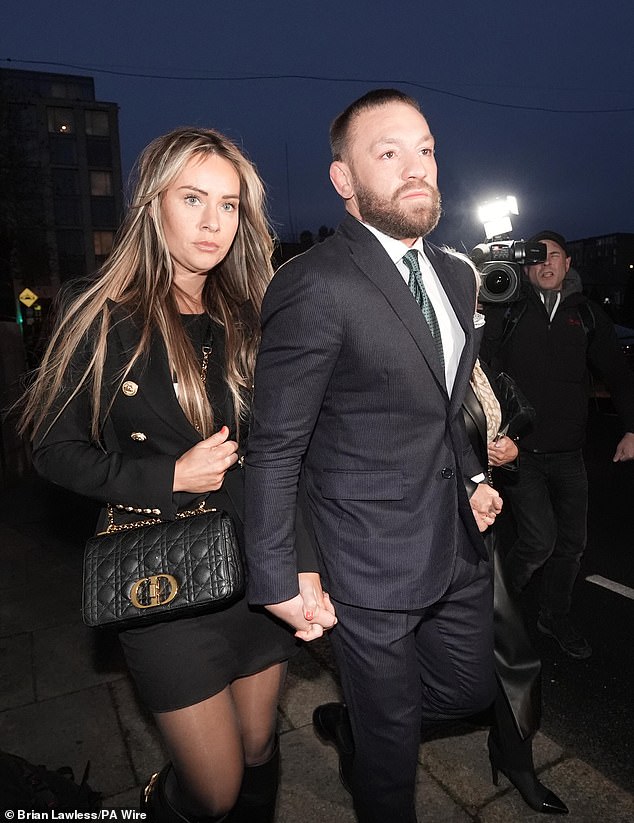 Dee Devlin and Conor McGregor outside the High Court in Dublin holding hands last month.