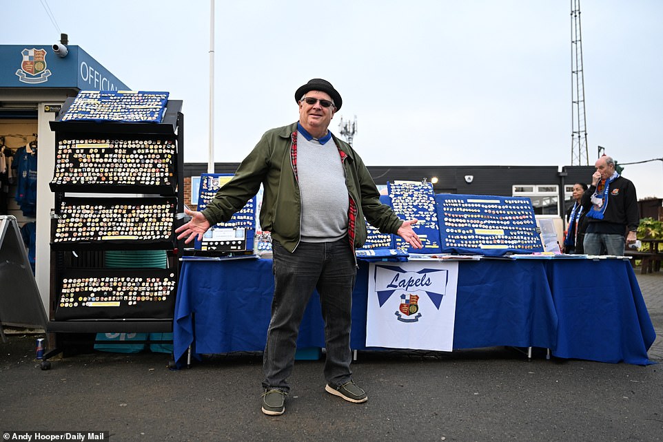 A Wealdstone fan proudly showed off his impressive collection of badges ahead of the big occasion on Saturday afternoon.