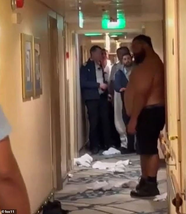 The disturbing footage, captured by Mikhail while he was just meters away, shows the passenger spiraling out of control in a fit of rage, kicking a door, shouting profane language and at one point ripping off his shirt.