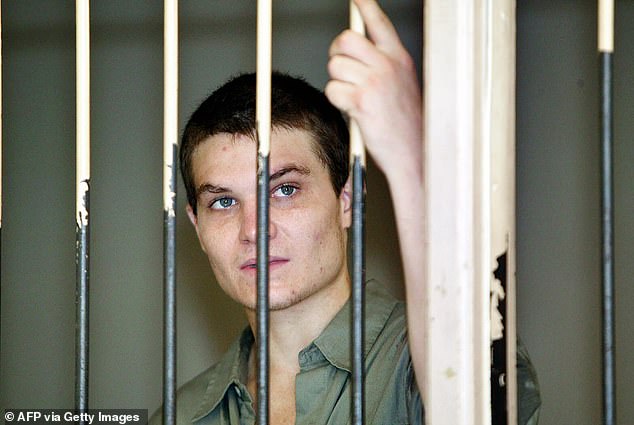 Scott Rush is photographed in a holding cell at Bali Police Headquarters in October 2005.