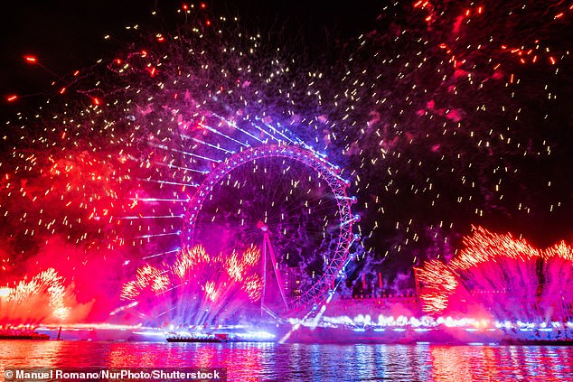 Fireworks explode around the London Eye during New Year's celebrations in London last year.