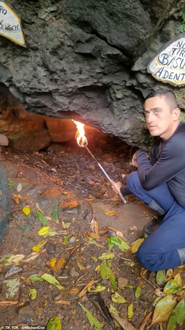 The recent video of the cave from April 2024, posted by TikToker Michael Adrescon (@MichaelCon), shows an apparent guide at this mysterious geological formation carrying a large flaming torch with a foot-long flame straight into the mouth of the Central American cave in waves