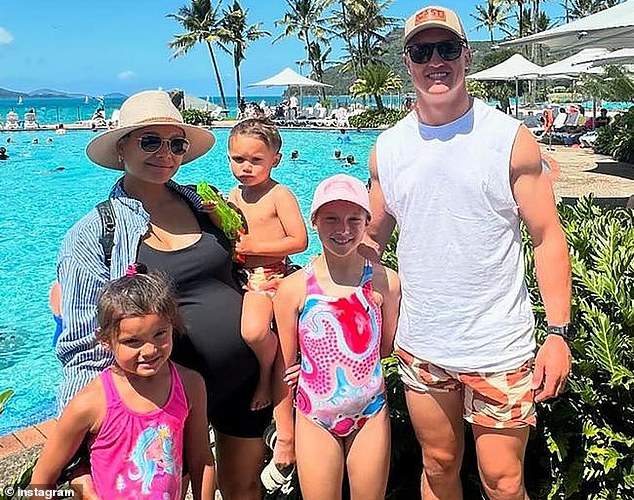 The Wighton family is pictured with Monisha still pregnant with baby Kove.