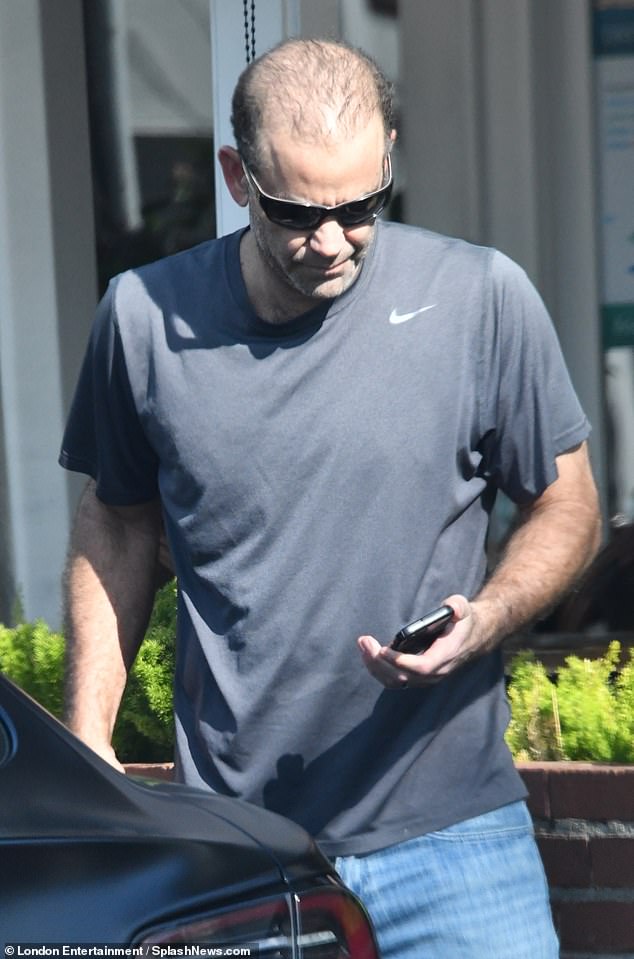 In another photo, tennis legend Sampras could be seen looking at his cell phone.