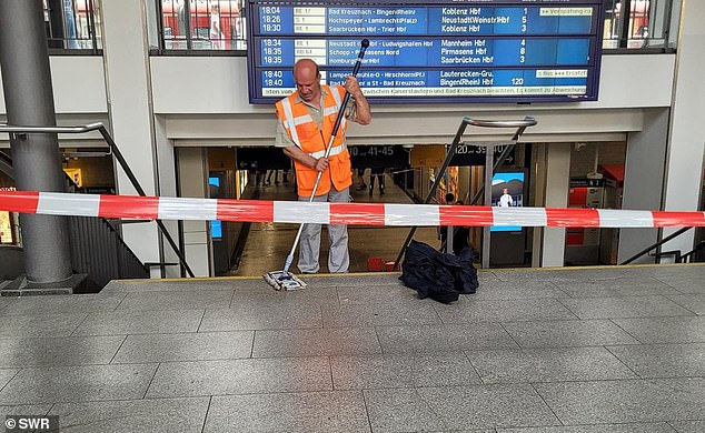 The woman, 20, was standing on an escalator at the Kaiserslautern train station (near the underpass shown above), in the southwestern state of Rhineland-Palatinate, when the 64-year-old man allegedly grabbed her hand. back on June 29.