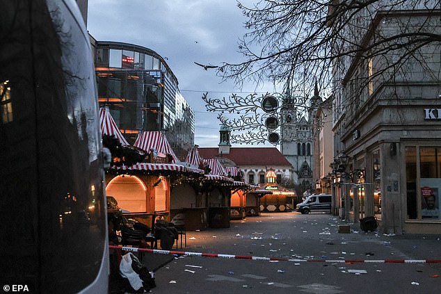 The scene of a car ram attack has been cordoned off at the Christmas market