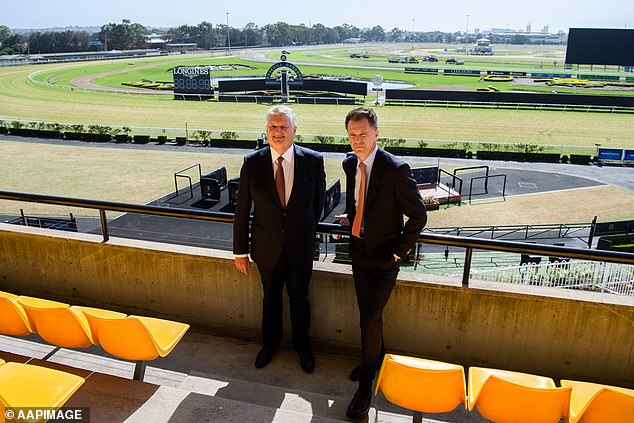 Minns is accused of rushing a deal to turn Sydney's Rosehill Gardens racecourse (pictured Minns and ATC president Peter McGauren on the course) into a new suburb after an informal meeting with McMahon.